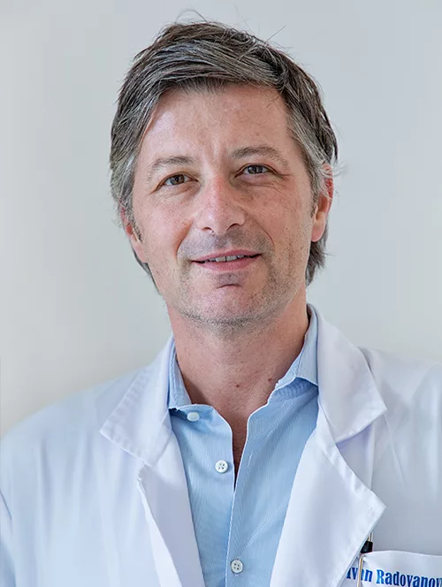 Head shot of Ivan Radovanovic staring at the camera.