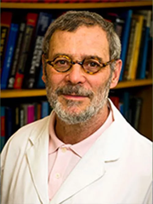 Head shot of Michael Schwartz staring at the camera.