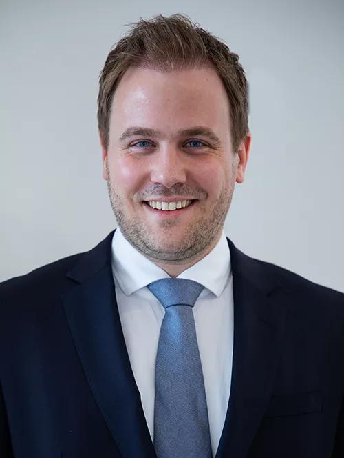 Head shot of Eef Hendriks staring at the camera.