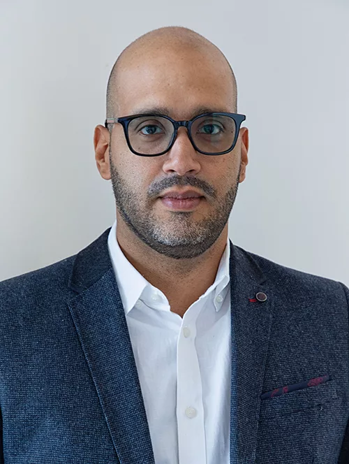 Head shot of Hugo Andrade Barazarte staring at the camera.